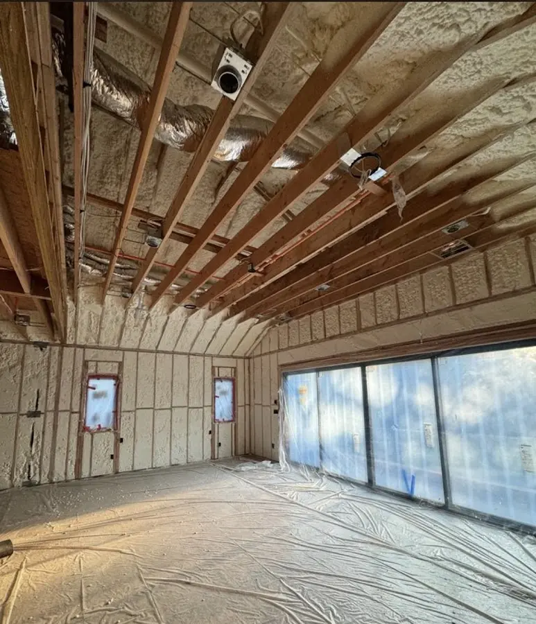 Interior walls and ceiling insulated with spray foam during new construction in Redding